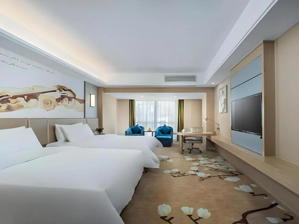 Bed in Vienna Hotel Fuzhou Changle Shouzhan Hangcheng Metro Station