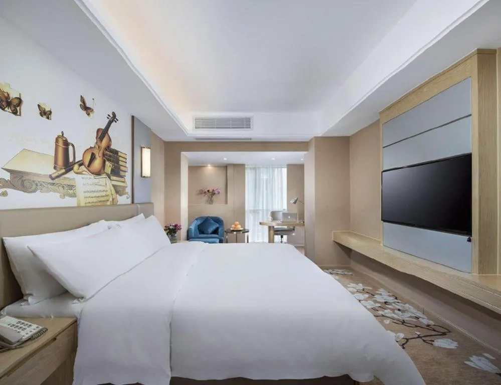 Bed in Vienna Hotel Fuzhou Changle Shouzhan Hangcheng Metro Station