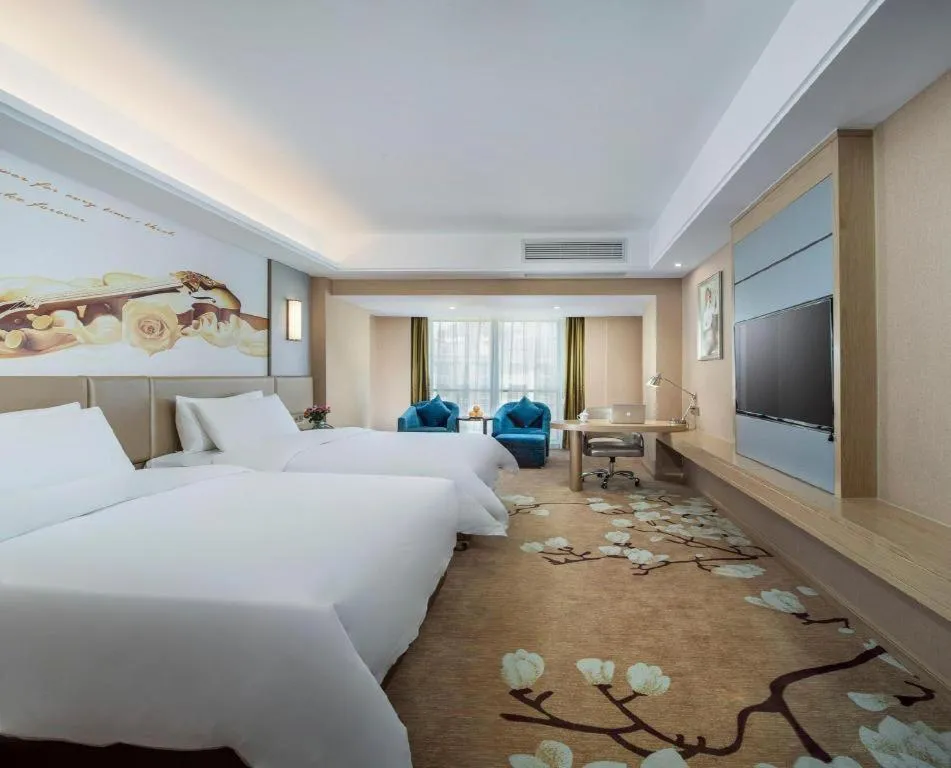 Bed in Vienna Hotel Fuzhou Changle Shouzhan Hangcheng Metro Station