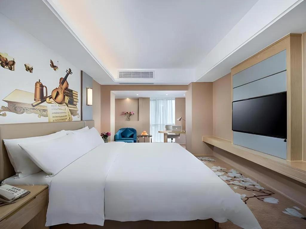 Bed in Vienna Hotel Fuzhou Changle Shouzhan Hangcheng Metro Station