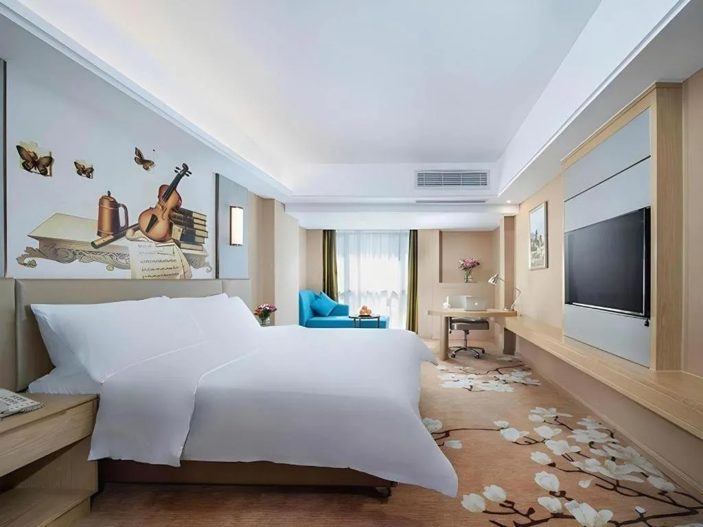 Bed in Vienna Hotel Fuzhou Changle Shouzhan Hangcheng Metro Station