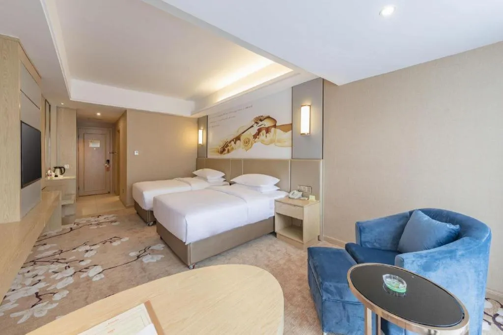 Bed in Vienna Hotel Fuzhou Changle Shouzhan Hangcheng Metro Station