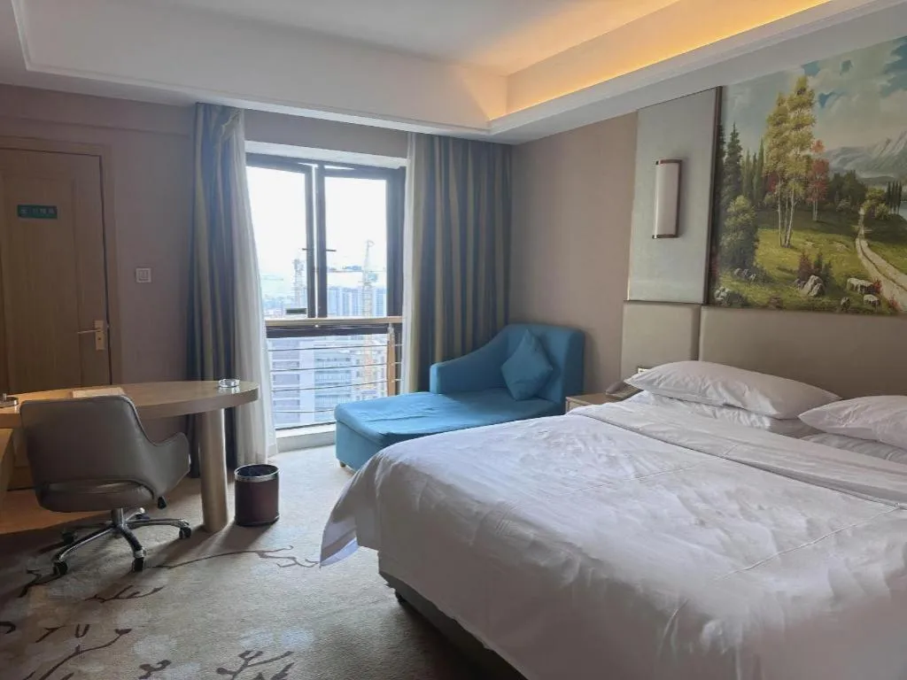 Bed in Vienna Hotel Fuzhou Changle Shouzhan Hangcheng Metro Station