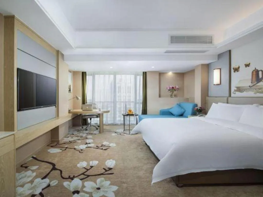 Bed in Vienna Hotel Fuzhou Changle Shouzhan Hangcheng Metro Station