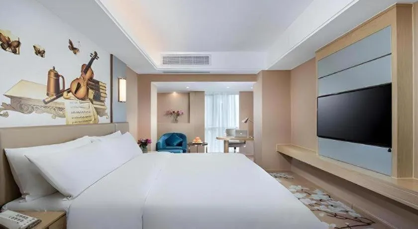 Bed in Vienna Hotel Fuzhou Changle Shouzhan Hangcheng Metro Station
