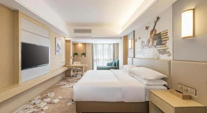 Bed in Vienna Hotel Fuzhou Changle Shouzhan Hangcheng Metro Station