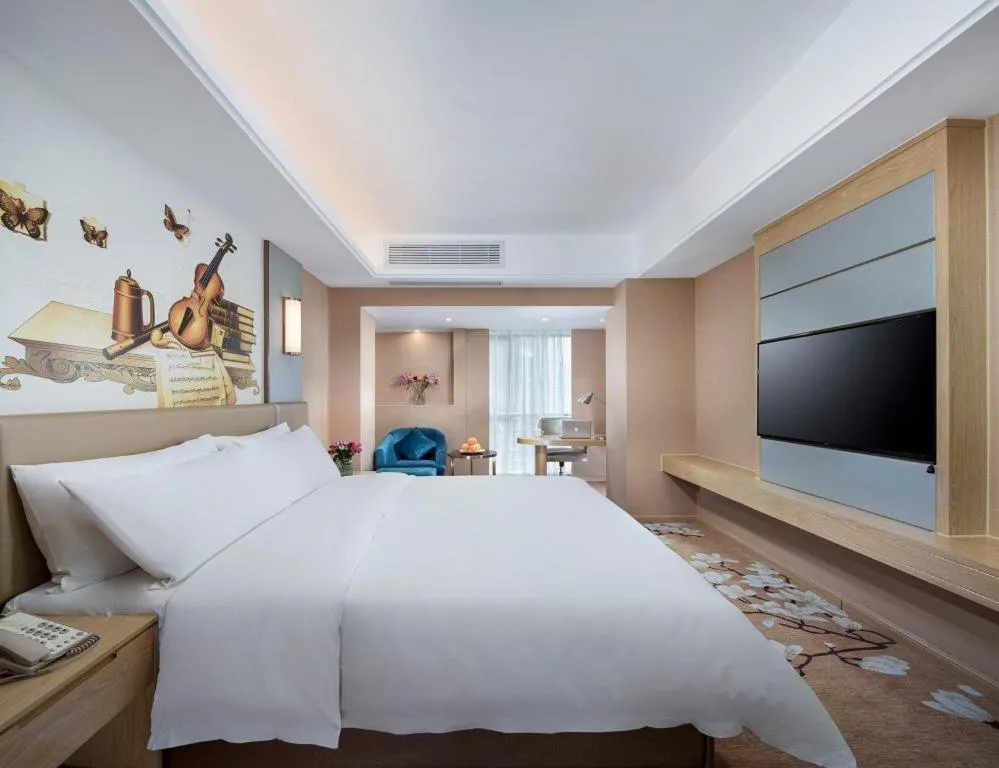 Bed in Vienna Hotel Fuzhou Changle Shouzhan Hangcheng Metro Station