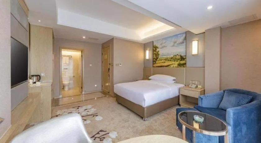 Bed in Vienna Hotel Fuzhou Changle Shouzhan Hangcheng Metro Station