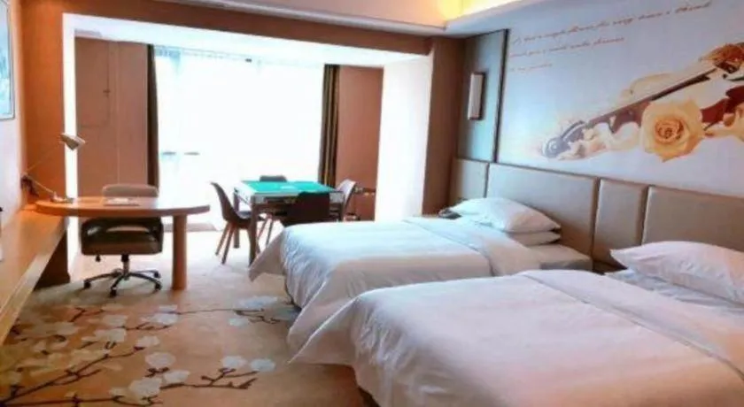 Bed in Vienna Hotel Fuzhou Changle Shouzhan Hangcheng Metro Station