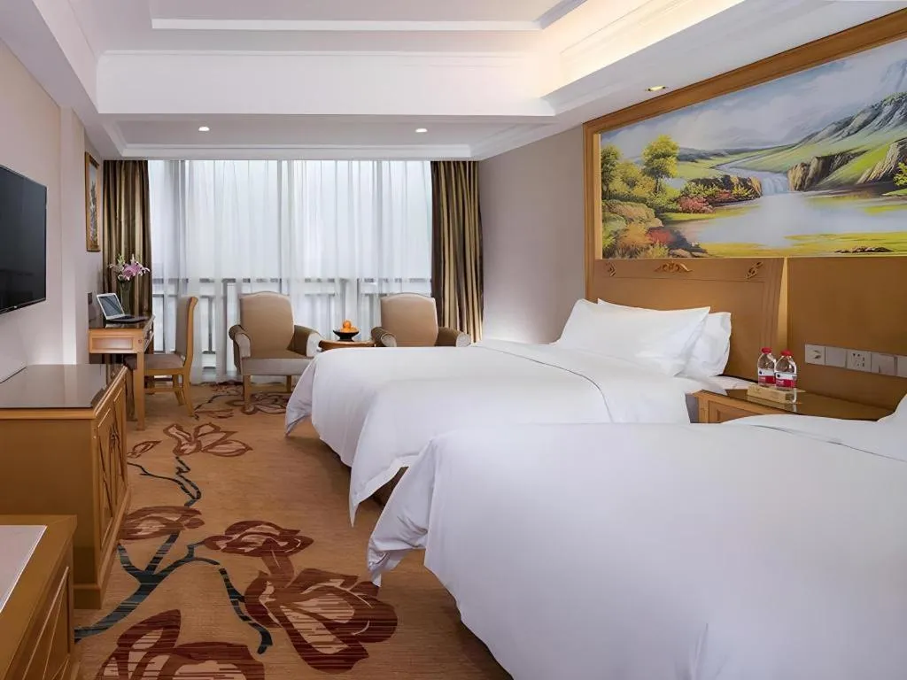 Bed in Vienna Hotel Guangxi Guilin Yongfu Station