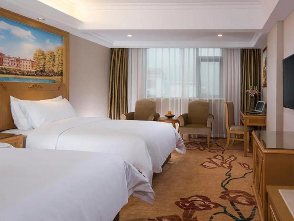 Bed in Vienna Hotel Guangxi Guilin Yongfu Station