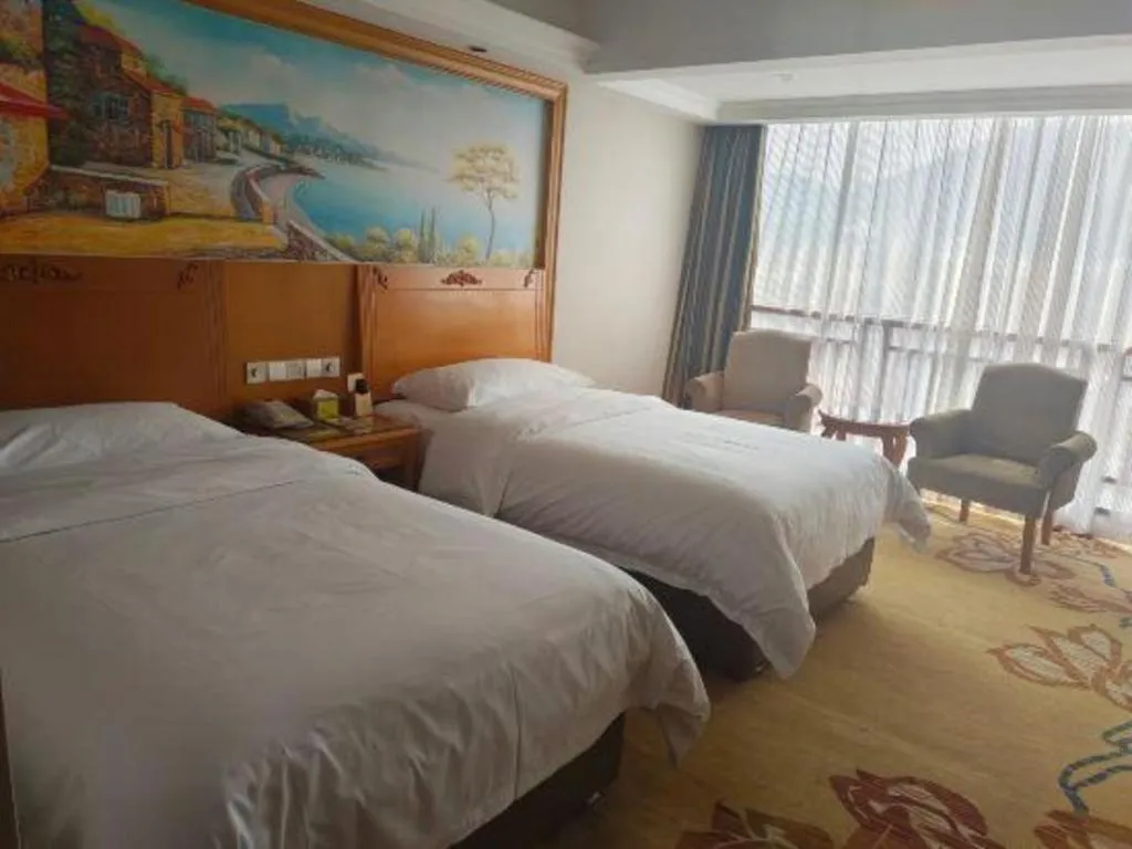 Bed in Vienna Hotel Guangxi Guilin Yongfu Station