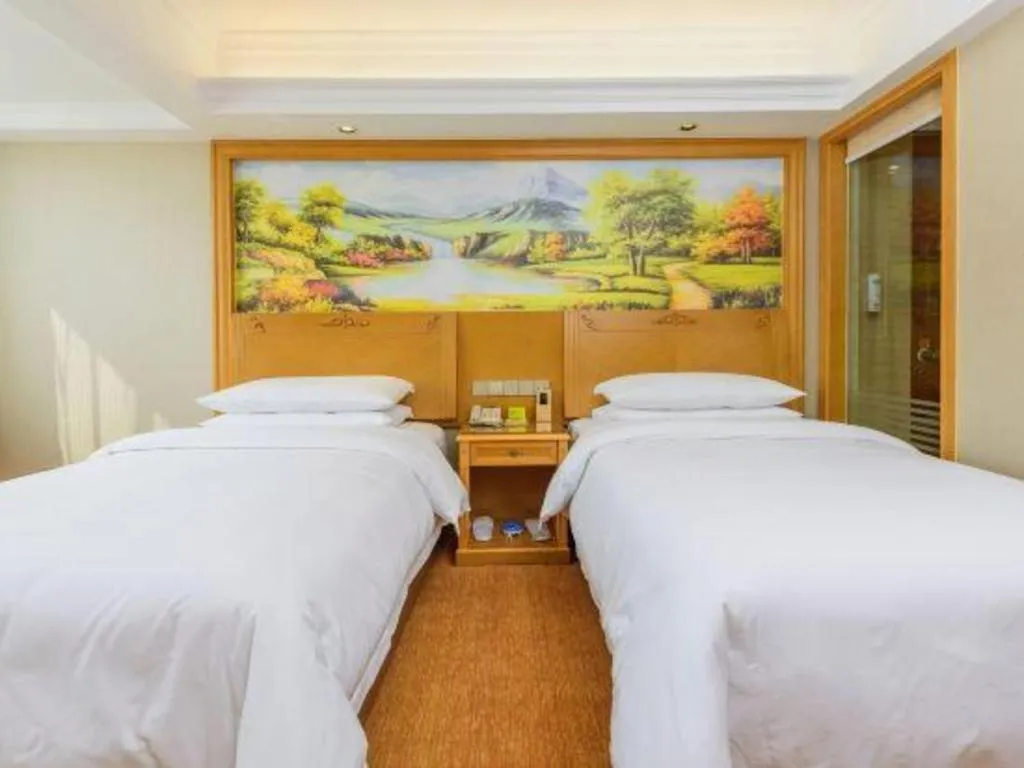 Bed in Vienna Hotel Guangxi Guilin Yongfu Station