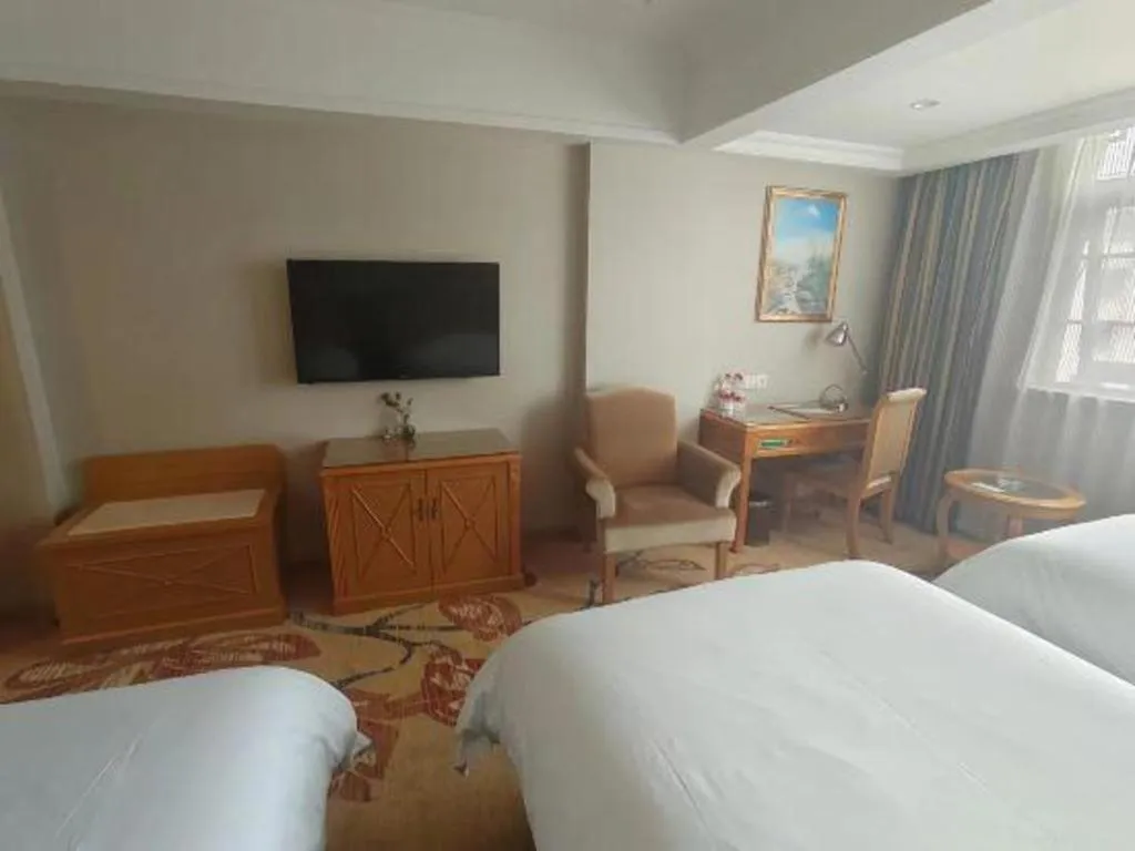 Bed in Vienna Hotel Guangxi Guilin Yongfu Station