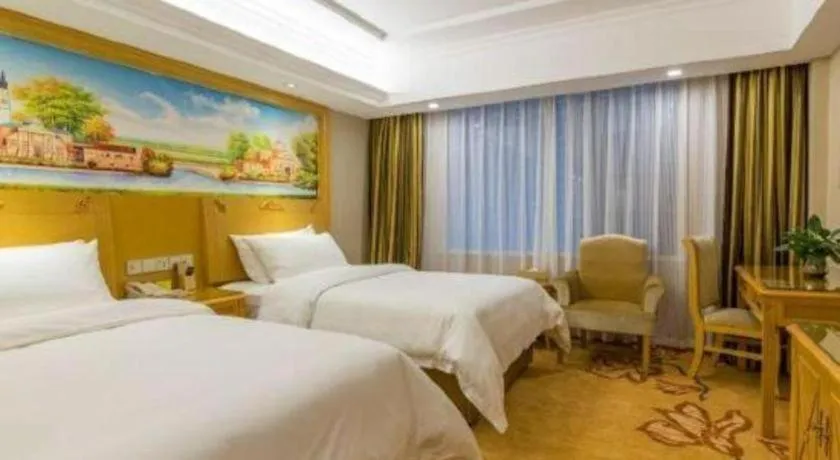 Bed in Vienna Hotel Guangxi Guilin Yongfu Station