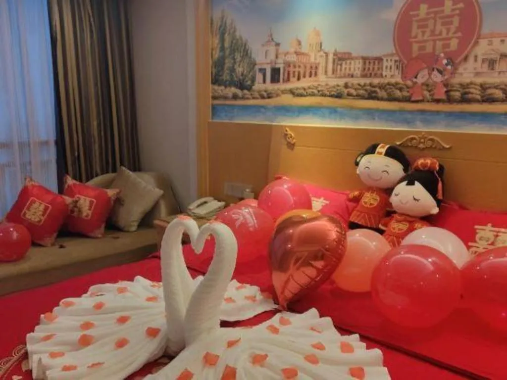 Bed in Vienna Hotel Guangxi Guilin Yongfu Station