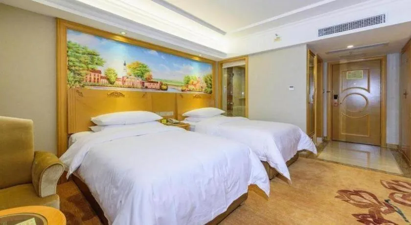 Bed in Vienna Hotel Guangxi Guilin Yongfu Station