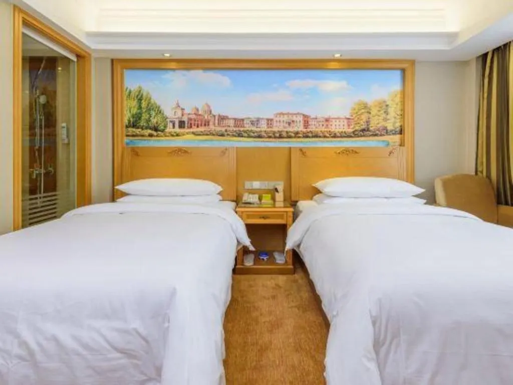 Bed in Vienna Hotel Guangxi Guilin Yongfu Station