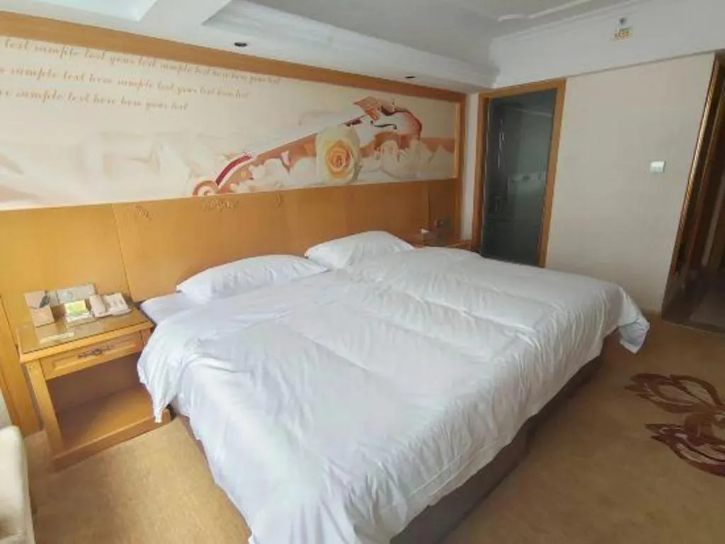 Bed in Vienna Hotel Guangxi Guilin Yongfu Station