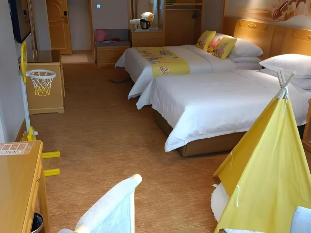 Bed in Vienna Hotel Guangxi Hezhou Guposhan Suifeng