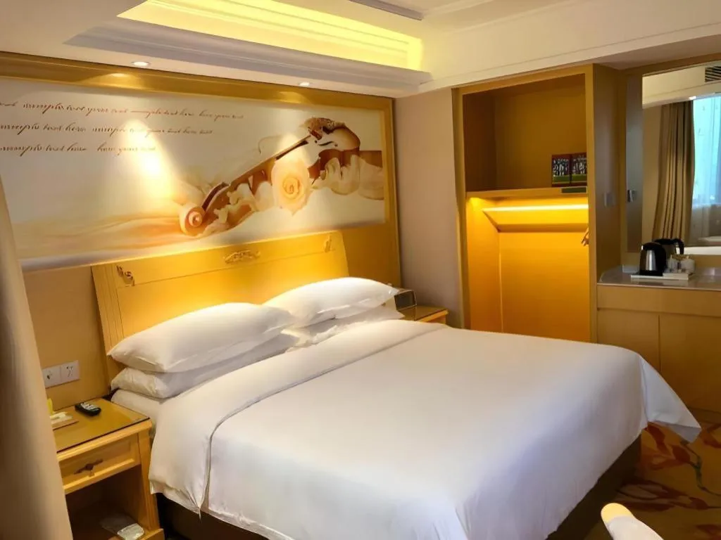 Bed in Vienna Hotel Guangxi Hezhou Guposhan Suifeng