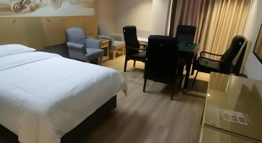 Bed in Vienna Hotel Guangxi Hezhou Guposhan Suifeng