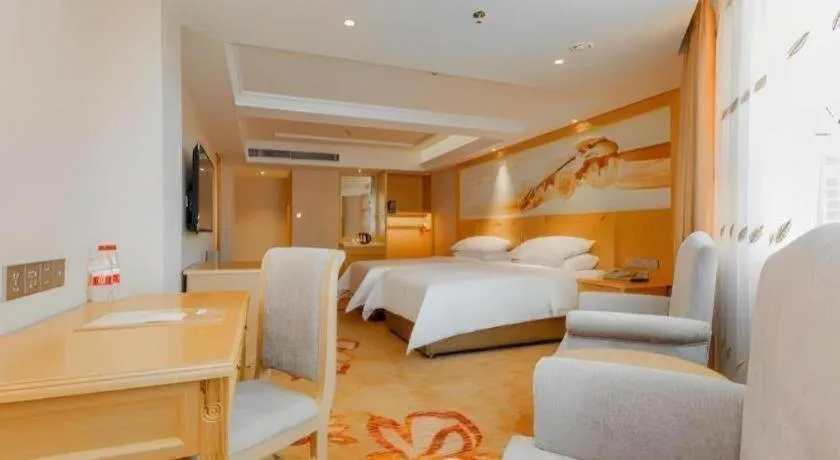 Bed in Vienna Hotel Guangxi Hezhou Guposhan Suifeng