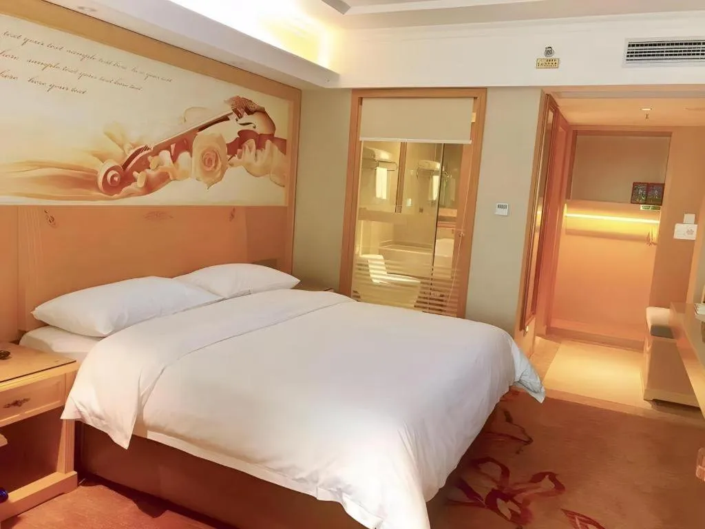 Bed in Vienna Hotel Guangxi Hezhou Guposhan Suifeng