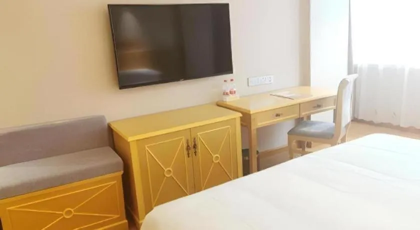 Bed in Vienna Hotel Guangxi Hezhou Guposhan Suifeng