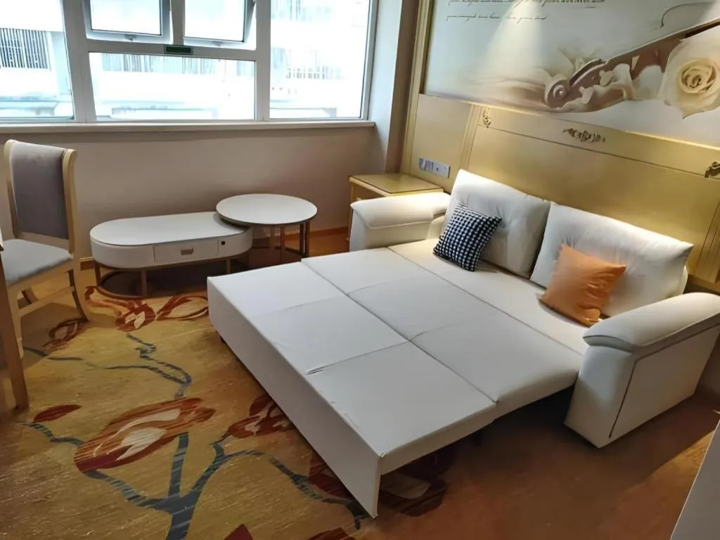 Bed in Vienna Hotel Guangxi Hezhou Guposhan Suifeng