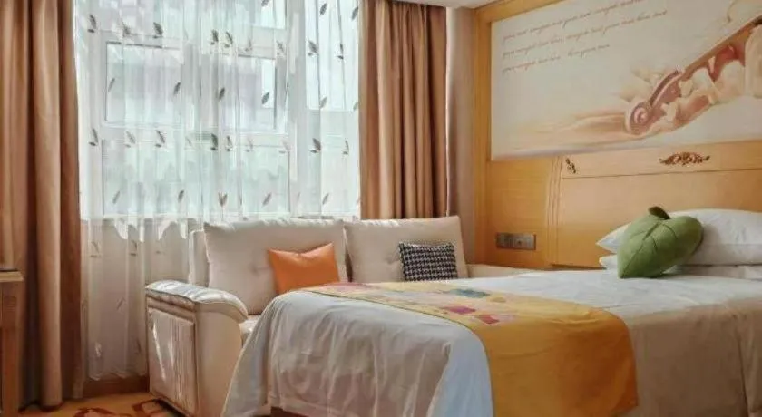 Bed in Vienna Hotel Guangxi Hezhou Guposhan Suifeng