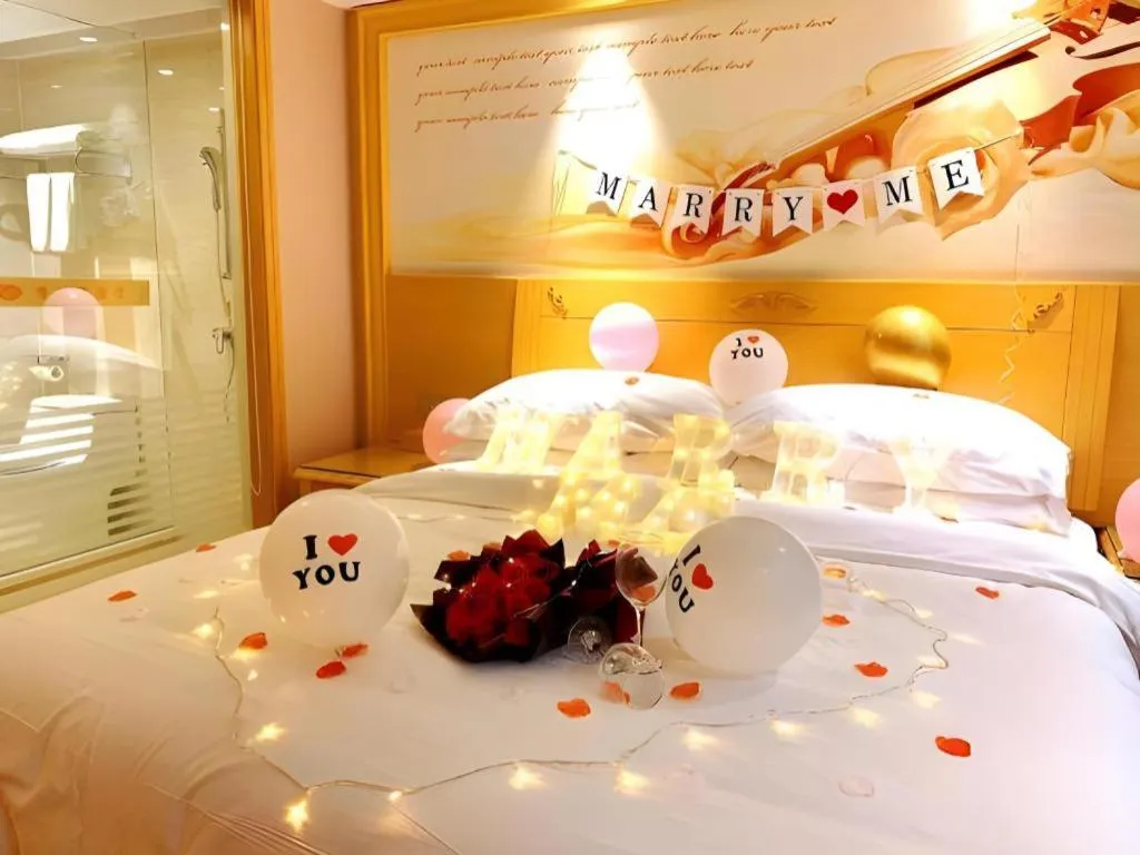 Bed in Vienna Hotel Guangxi Hezhou Guposhan Suifeng