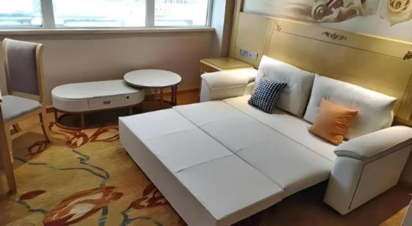 Bed in Vienna Hotel Guangxi Hezhou Guposhan Suifeng