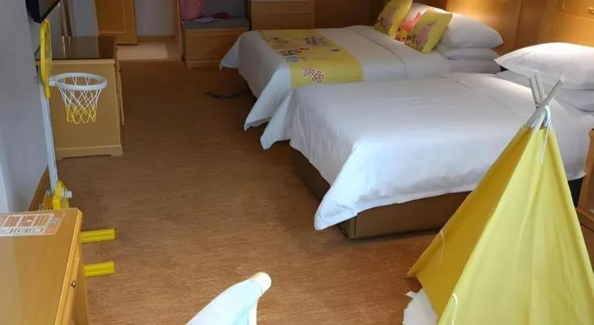 Bed in Vienna Hotel Guangxi Hezhou Guposhan Suifeng