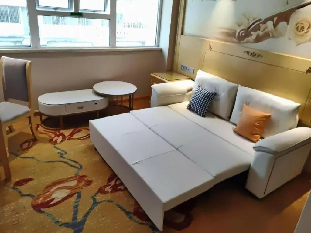 Bed in Vienna Hotel Guangxi Hezhou Guposhan Suifeng