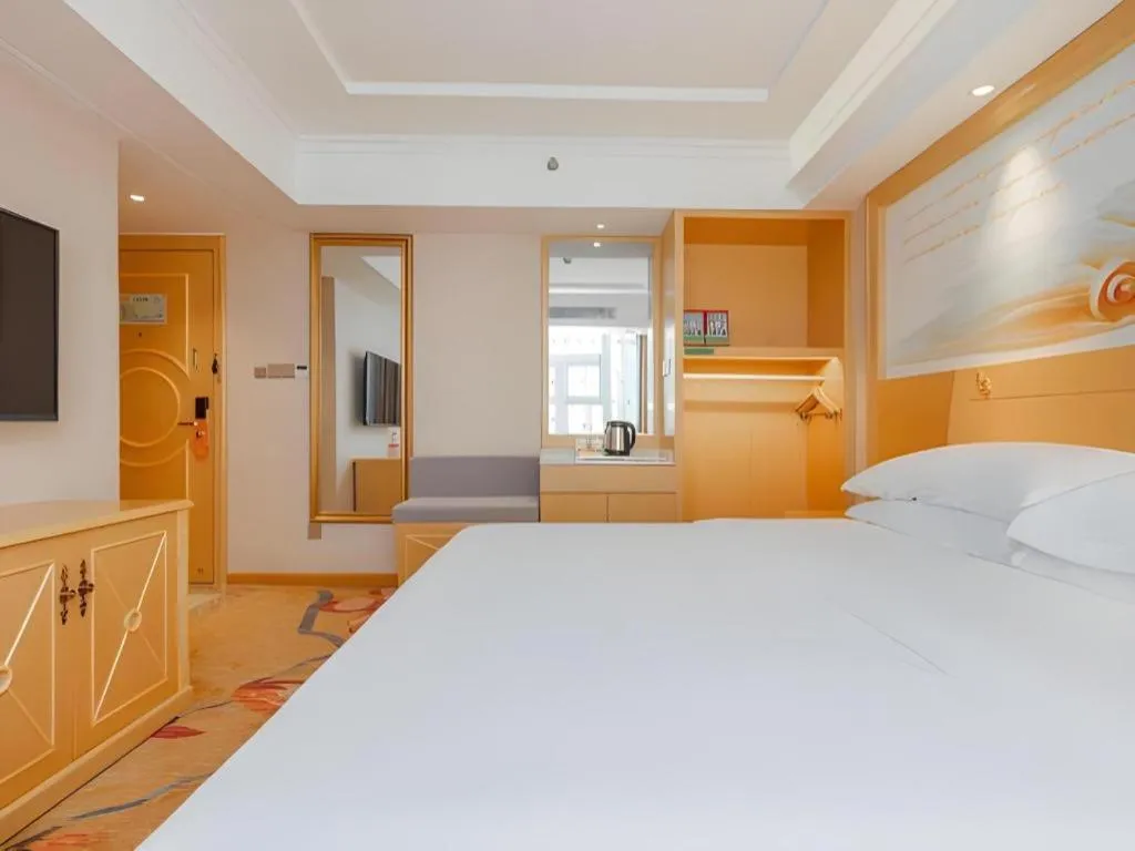 Bed in Vienna Hotel Guangxi Hezhou Guposhan Suifeng