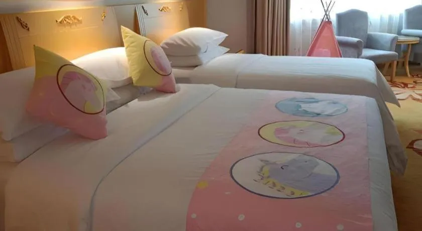 Bed in Vienna Hotel Guangxi Hezhou Guposhan Suifeng