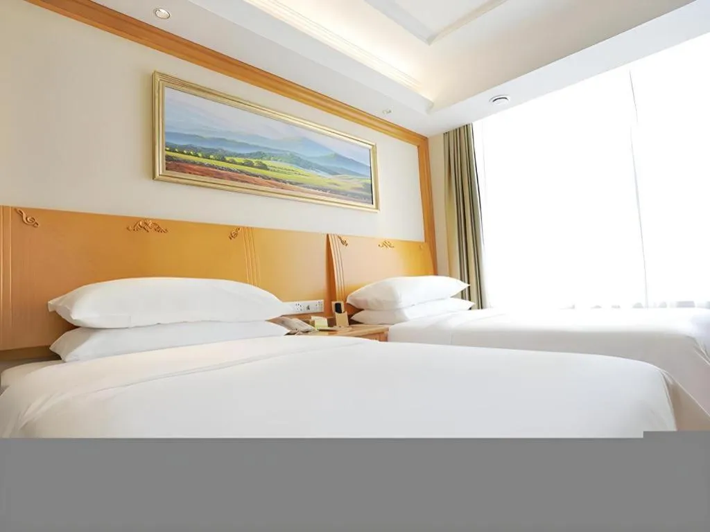 Bed in Vienna Hotel Shenyang Central Street