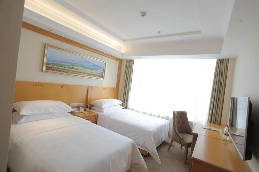 Bed in Vienna Hotel Shenyang Central Street