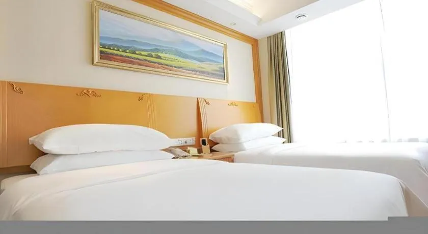 Bed in Vienna Hotel Shenyang Central Street