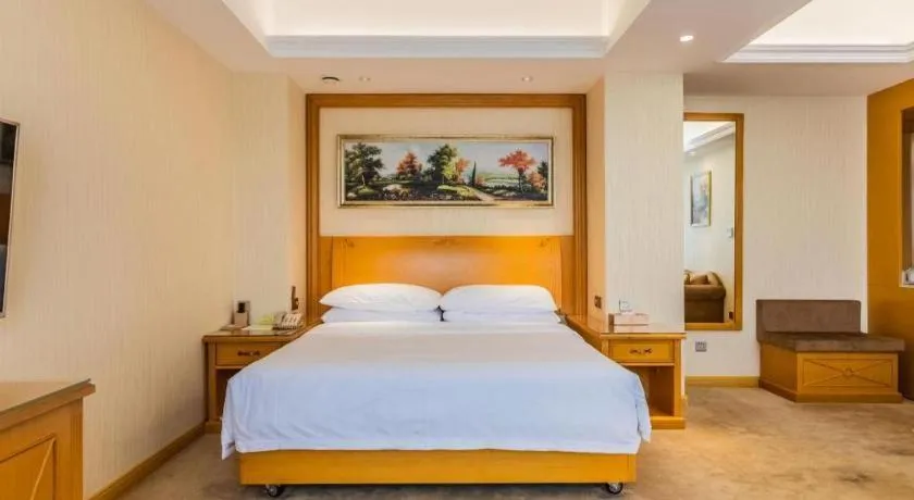 Bed in Vienna Hotel Shenyang Central Street