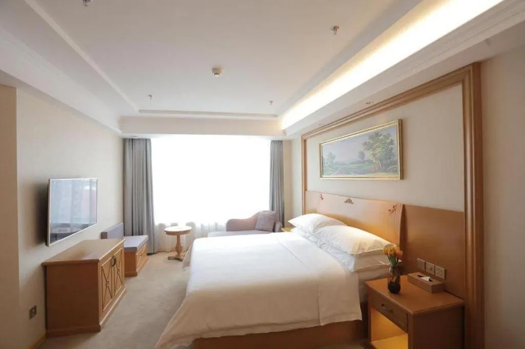 Bed in Vienna Hotel Shenyang Central Street