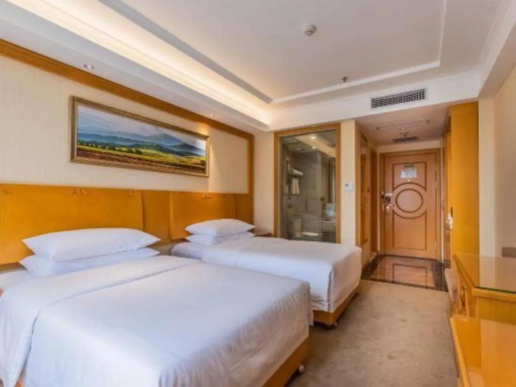 Bed in Vienna Hotel Shenyang Central Street