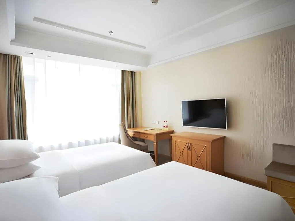 Bed in Vienna Hotel Shenyang Central Street