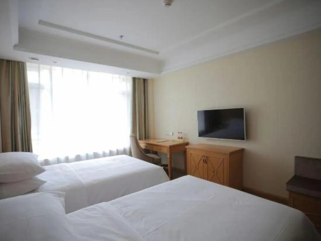 Bed in Vienna Hotel Shenyang Central Street