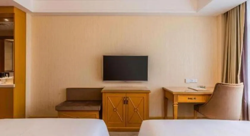 Bed in Vienna Hotel Shenyang Central Street