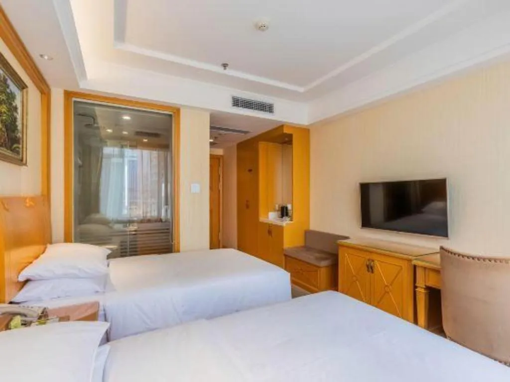 Bed in Vienna Hotel Shenyang Central Street