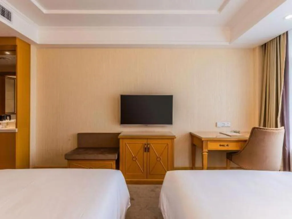 Bed in Vienna Hotel Shenyang Central Street