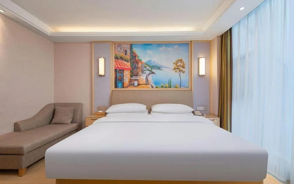 Bed in Vienna Hotel Guizhou Liupanshui Shuicheng Ancient Town