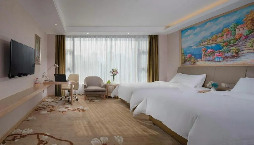 Bed in Vienna Hotel Guizhou Liupanshui Shuicheng Ancient Town